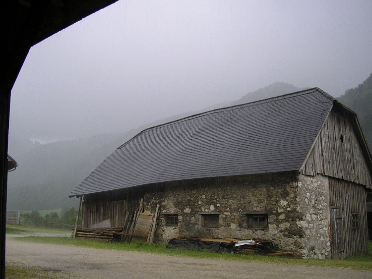 Shelter for the thunderstorm under a farmhouse