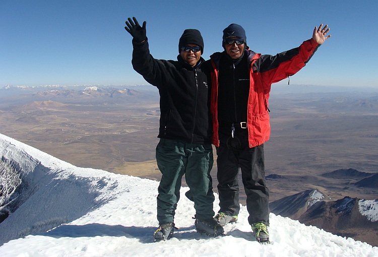 The guide and the teacher on top of the Parinacota volcano