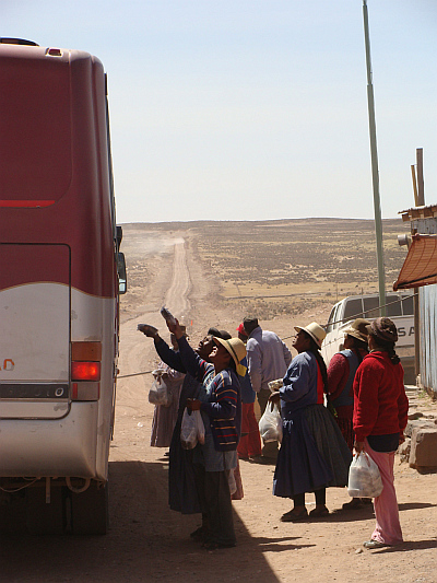 The bus stops in a lonely settlement on the Altiplano