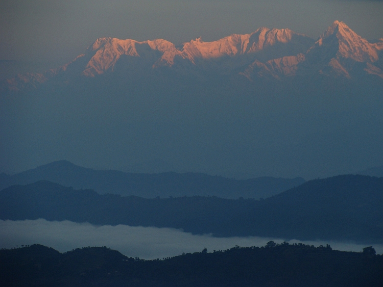 Himalaya Sunrise. From left to right Annapurna South (7.219 m), Baraha Shikhar (7.647 m) and Macchapucchare (6.997 m)